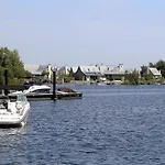 Modern Lodge On The Water In A National Park